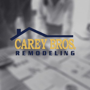 Carey Bros Remodeling logo set on blurred black and white photo background